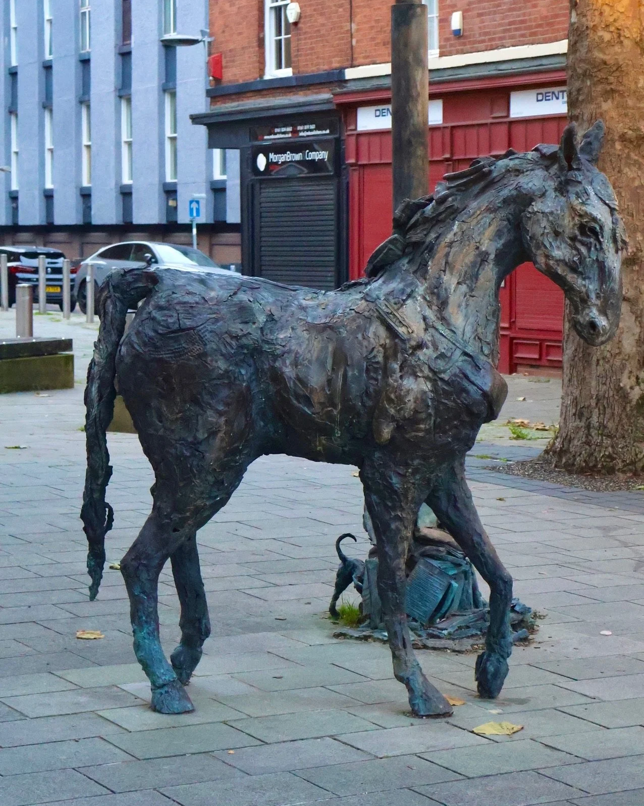 Bronze memorial statue of Old Billy on Canal Street in Manchester