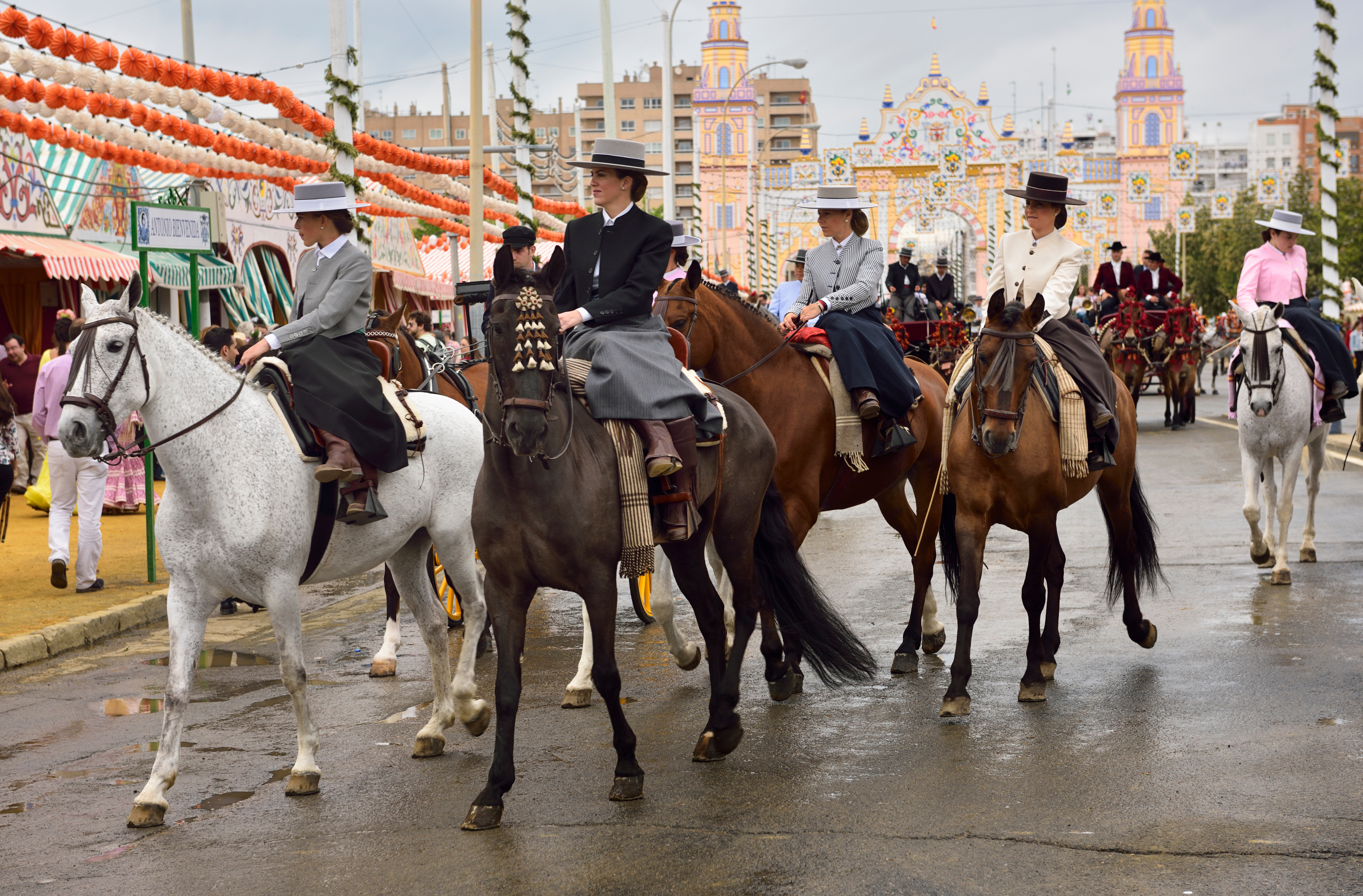 Woman riding sidesaddle in traditional Spanish attire