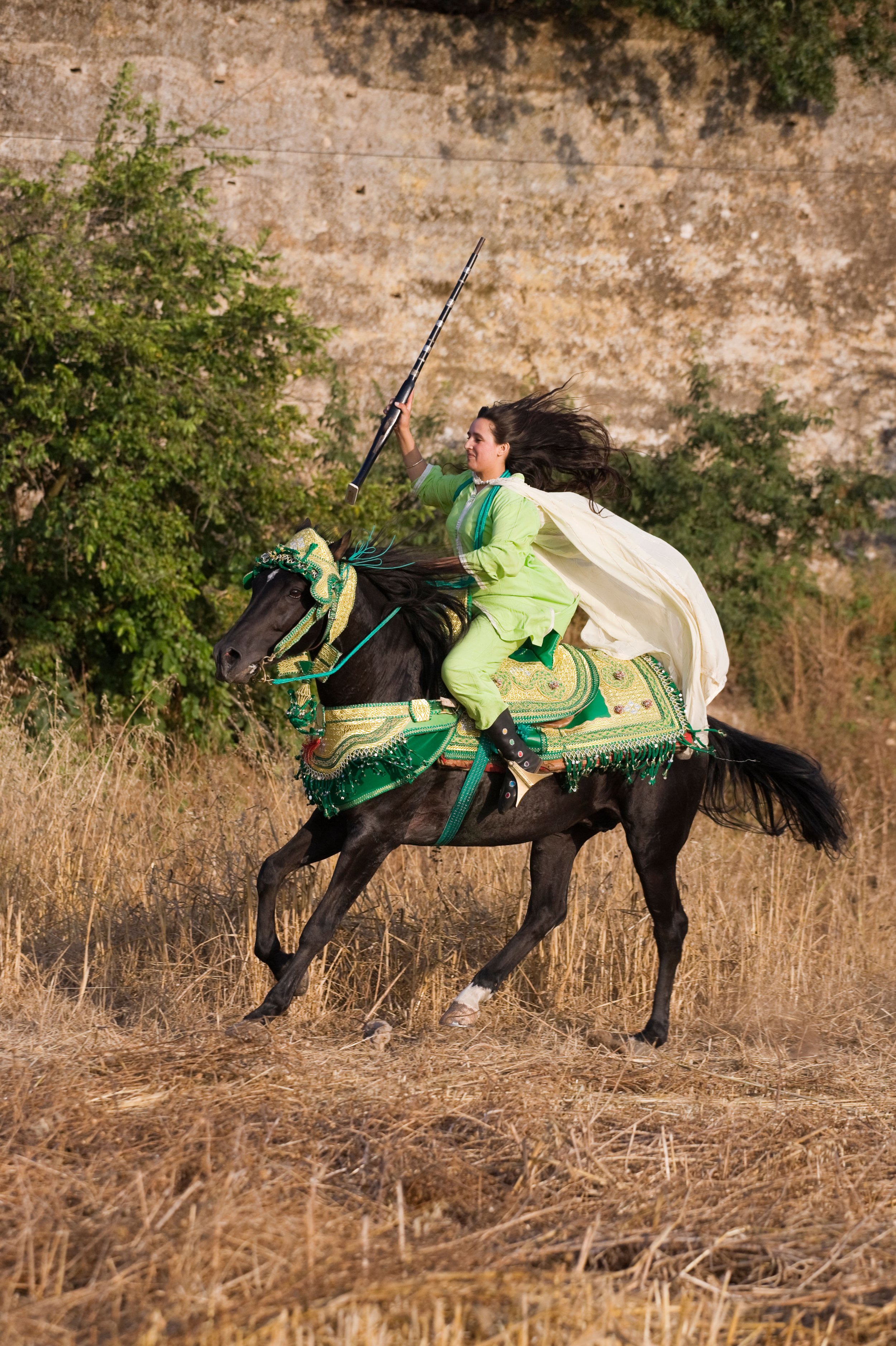 Female riders participating in Tbourida